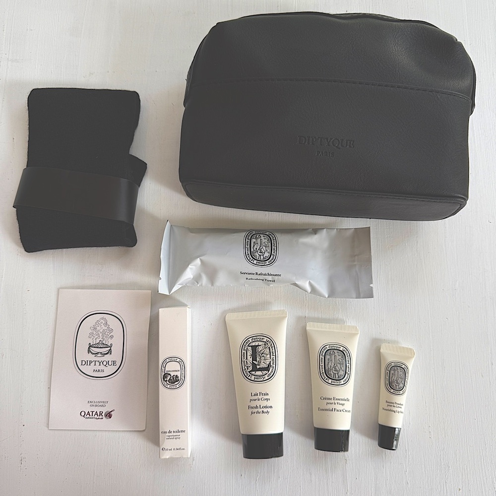 New Diptyque pink ribbon amenity kit for Qatar Airways in Philosykos fragrance